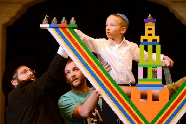 KAREN QUINCY LOBERG/THE STAR Yakov Lang has the honor of lighting the large menorah made of Legos on Wednesday, the day of his eighth birthday at Constitution Park in Camarillo on Wednesday. Read more: http://www.vcstar.com/photos/galleries/2013/dec/04/lego-menorah/#ixzz2ovZ4QGJV  - vcstar.com 